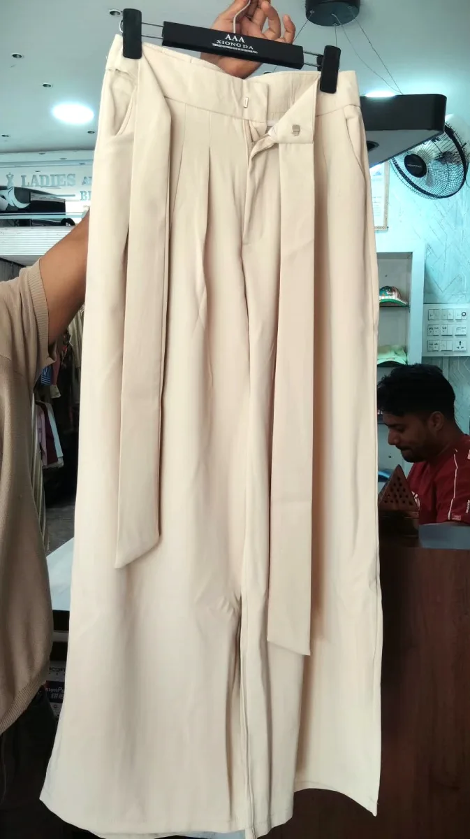 Women's High-Waisted Pleated Wide-Leg Trousers in Beige